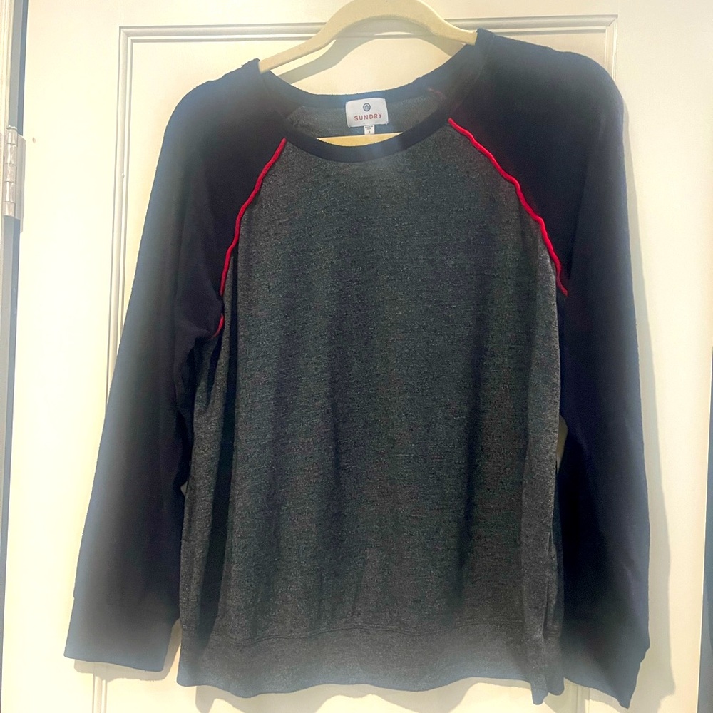 Sweater with piping detail